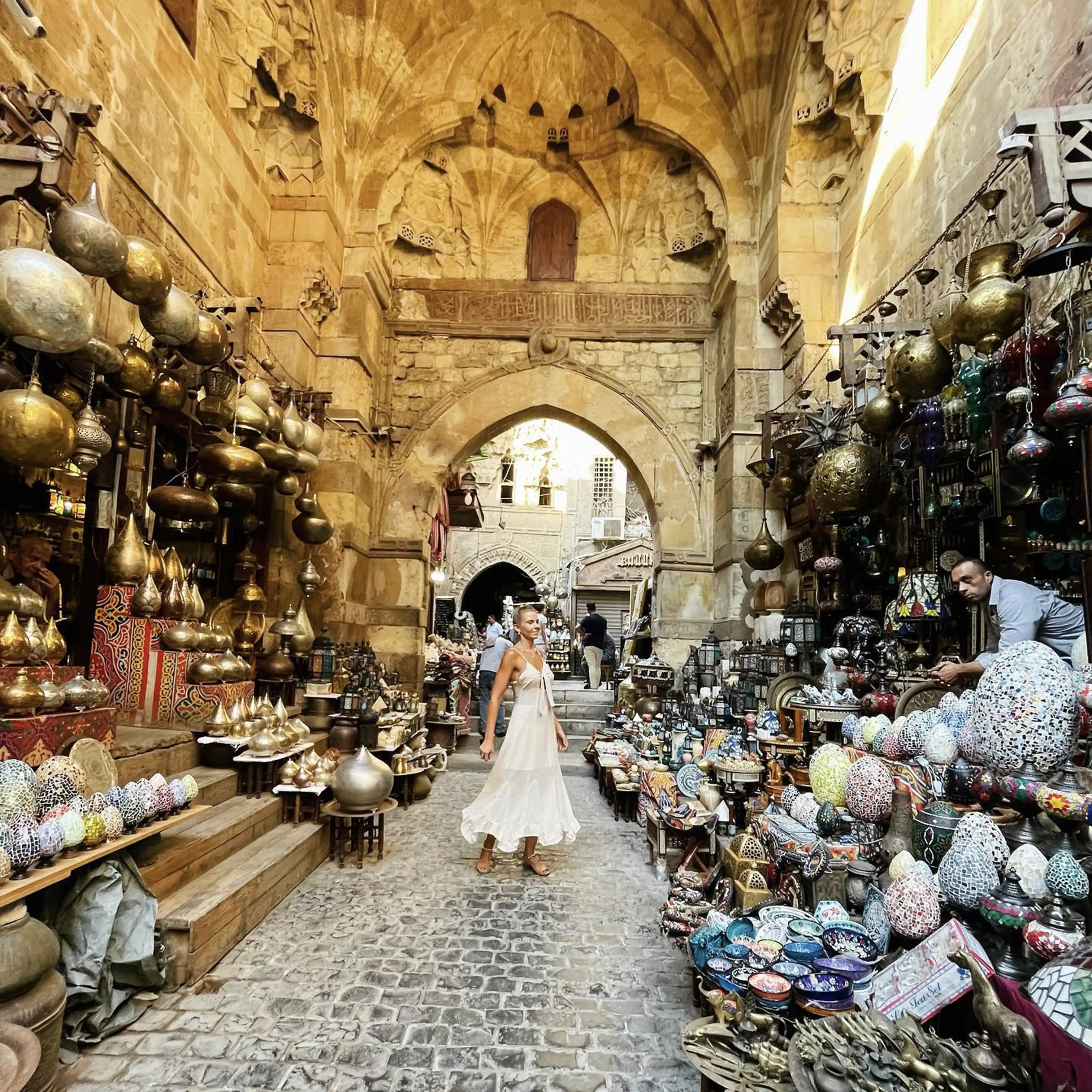 Lady standing in Khan elkhalili and booked day tour with iEgypt tours and travels