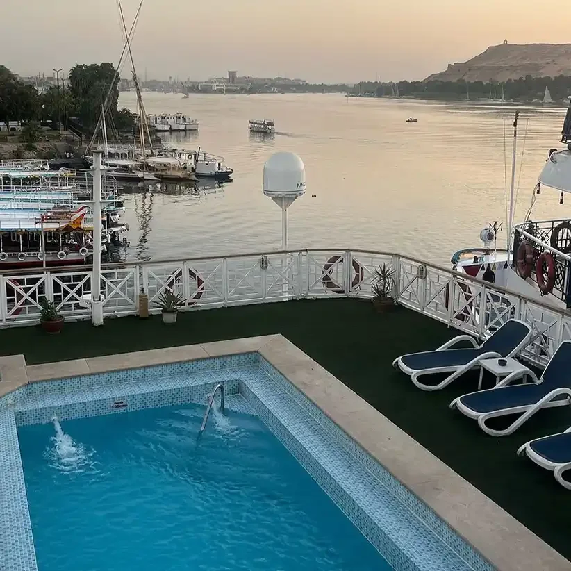 The swimming pool and sun loungers on the top deck of a Nile cruise ship