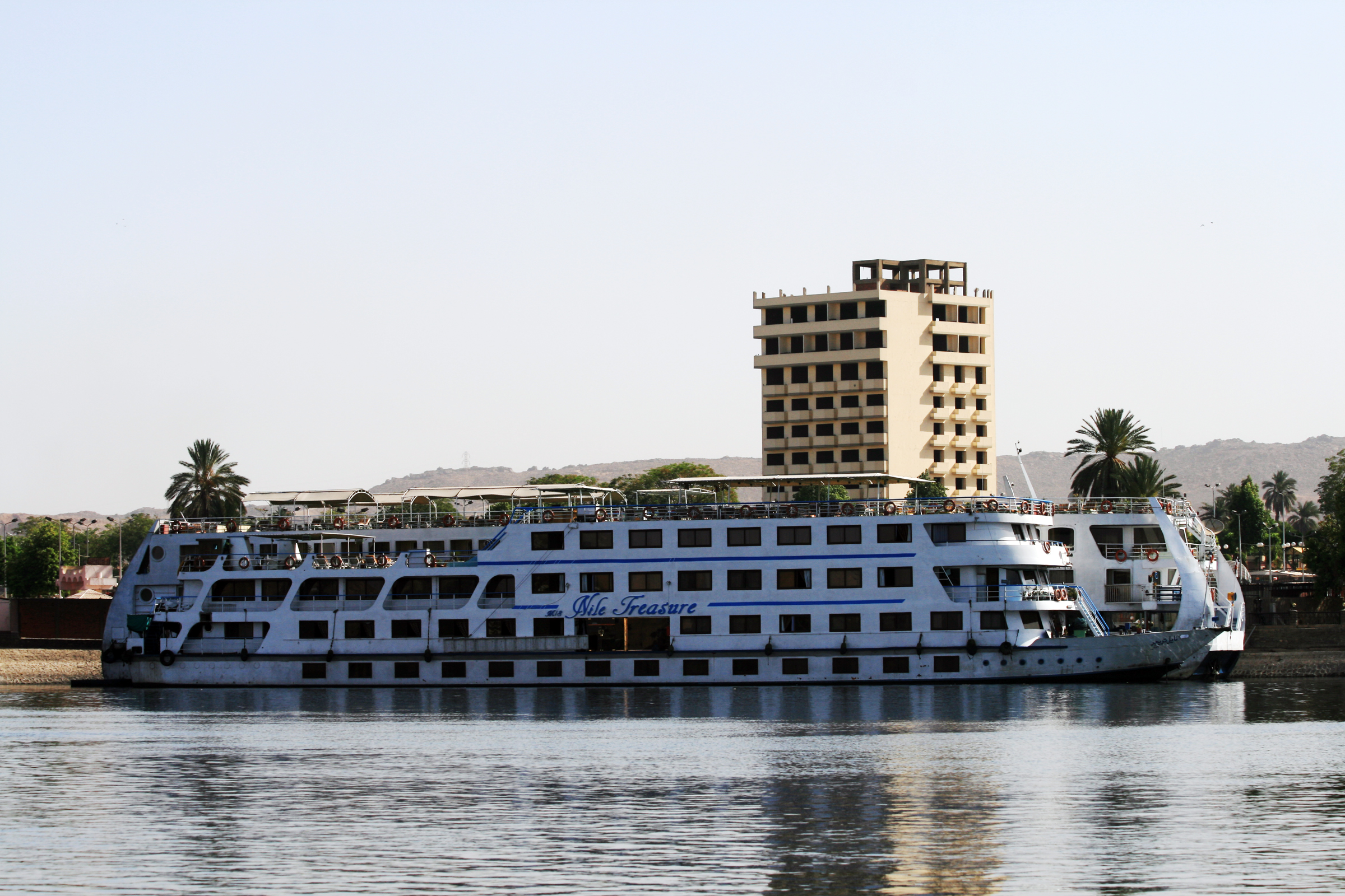 A Nile cruise ship moored on the river in Egypt, part of the 9-day solar eclipse tour