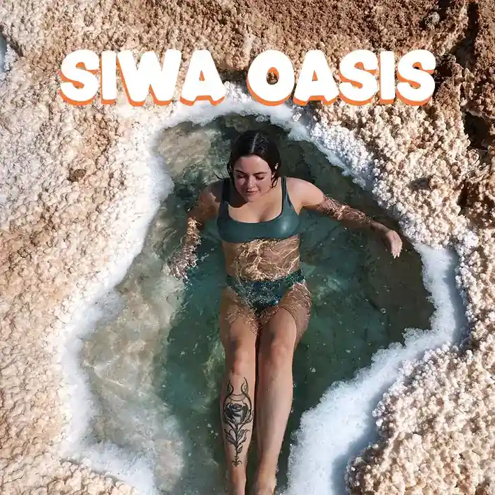 Woman floating in Siwa Oasis Salt lakes with iEgypt tours & travels